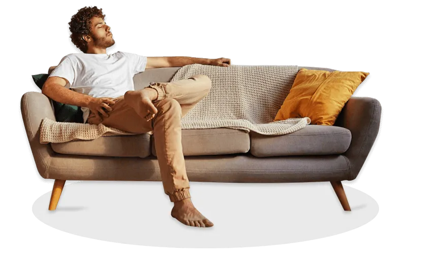 man sitting on urbanwood fabric sofa relaxing